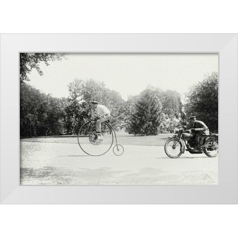 Motorcycle cop chases a Penny Farthing Velocipede White Modern Wood Framed Art Print by Unknown