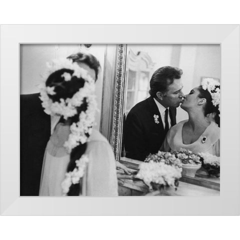 Elizabeth Taylor and Richard Burton in 1964 White Modern Wood Framed Art Print by Hollywood Photo Archive