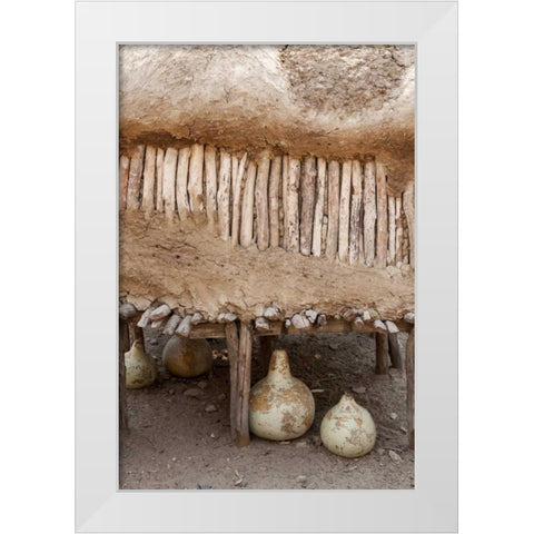 Namibia, Opuwo Gourds under food storage hut White Modern Wood Framed Art Print by Kaveney, Wendy
