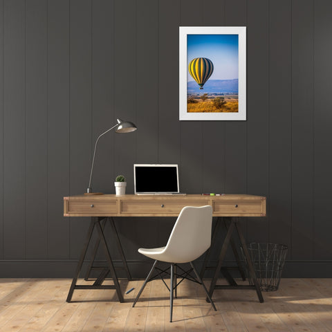 A hot-air balloon slowly traverses over the Serengeti plain White Modern Wood Framed Art Print by Richardson, Larry