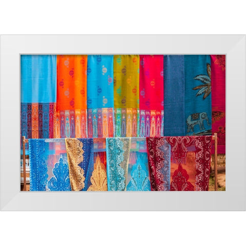Laos- Luang Prabang. Colorful textiles- possibly scarves- for sale. White Modern Wood Framed Art Print by Haseltine, Tom