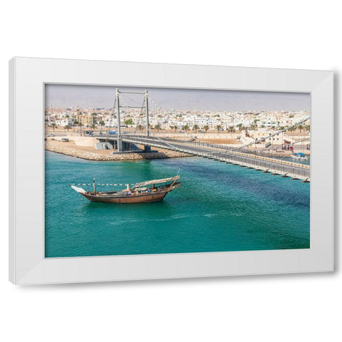 Middle East-Arabian Peninsula-Oman-Al Batinah South-Dhow passing under a suspension bridge White Modern Wood Framed Art Print by Wilson, Emily M.