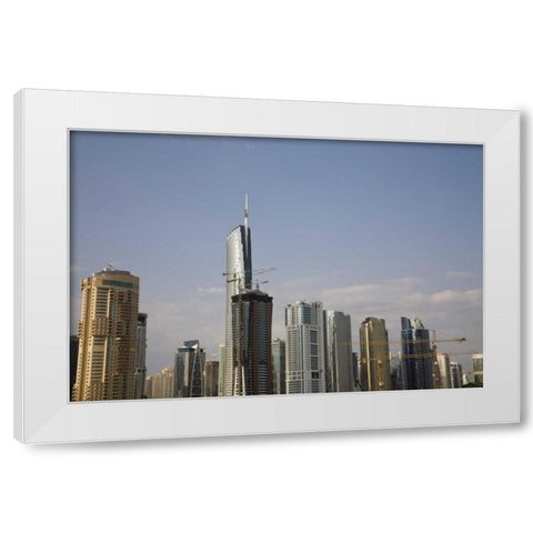 UAE, Dubai Construction amid skyscrapers White Modern Wood Framed Art Print by Young, Bill