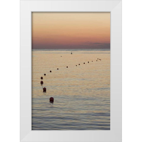 UAE, Fujairah Sunrise over marker buoys on beach White Modern Wood Framed Art Print by Young, Bill