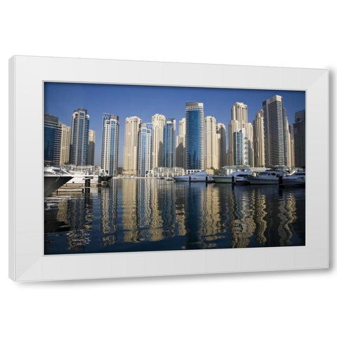 UAE, Dubai Marina towers with boats at anchor White Modern Wood Framed Art Print by Young, Bill