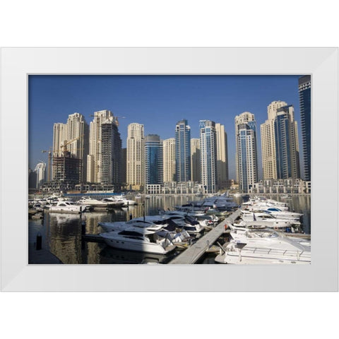 UAE, Dubai Marina towers with boats at anchor White Modern Wood Framed Art Print by Young, Bill