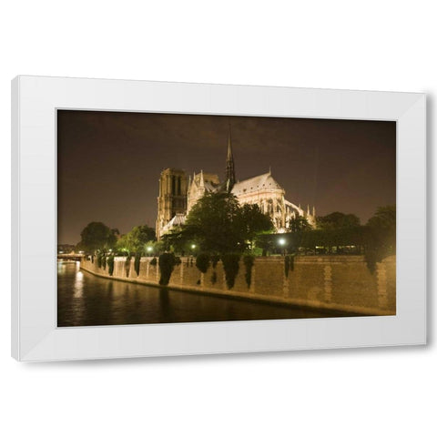 France, Paris Notre Dame Cathedral lit at night White Modern Wood Framed Art Print by Zuckerman, Jim