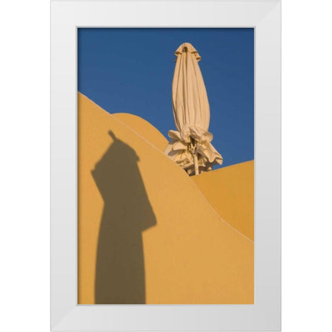 Greece, Santorini Sun umbrella against a wall White Modern Wood Framed Art Print by Young, Bill