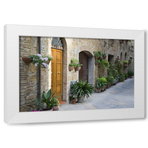 Italy, Pienza Potted plants line narrow streets White Modern Wood Framed Art Print by Flaherty, Dennis