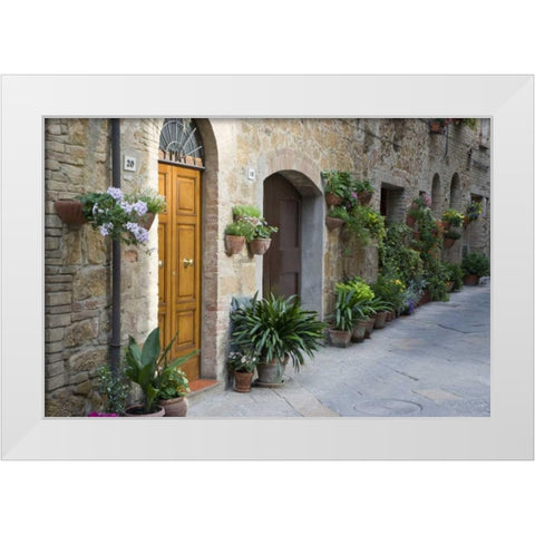 Italy, Pienza Potted plants line narrow streets White Modern Wood Framed Art Print by Flaherty, Dennis