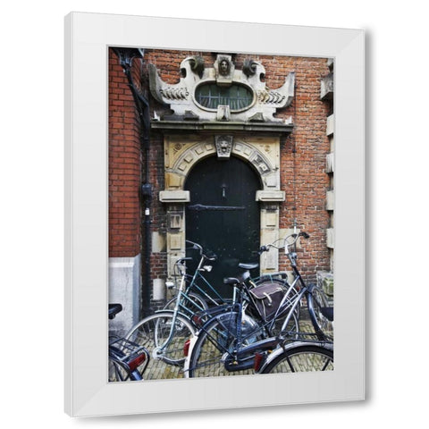 Netherlands, Amsterdam Bicycles by building door White Modern Wood Framed Art Print by Flaherty, Dennis