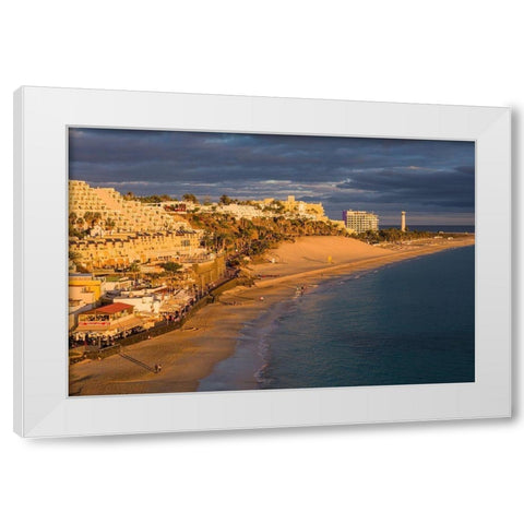 Canary Islands-Fuerteventura Island-Morro Jable-high angle view of Playa de la Cebada beach-sunset White Modern Wood Framed Art Print by Bibikow, Walter