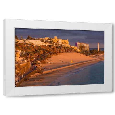 Canary Islands-Fuerteventura Island-Morro Jable-high angle view of Playa de la Cebada beach-sunset White Modern Wood Framed Art Print by Bibikow, Walter