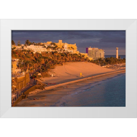Canary Islands-Fuerteventura Island-Morro Jable-high angle view of Playa de la Cebada beach-sunset White Modern Wood Framed Art Print by Bibikow, Walter