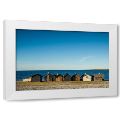 Sweden-Faro Island-Kursviken-coastal farmers fishing shacks-sunset White Modern Wood Framed Art Print by Bibikow, Walter