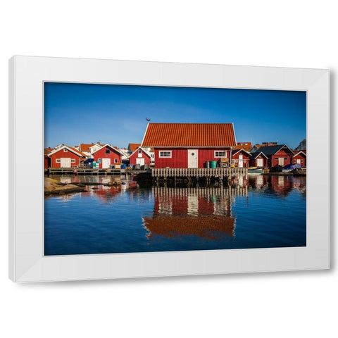 Sweden-Bohuslan-Kungshamn-red fishing shacks in the Fisketangen-old fishermans neighborhood White Modern Wood Framed Art Print by Bibikow, Walter