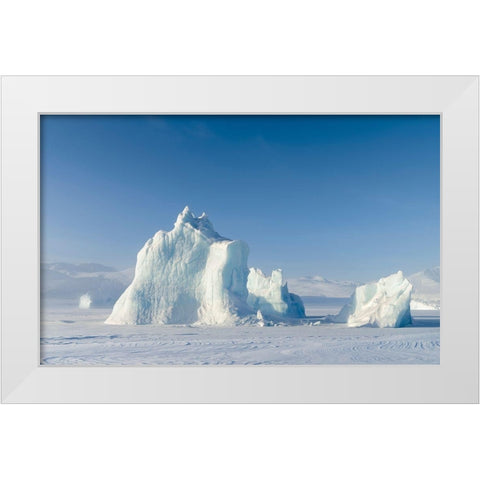 Icebergs frozen into the sea ice of the Uummannaq Fjord System during winter  White Modern Wood Framed Art Print by Zwick, Martin