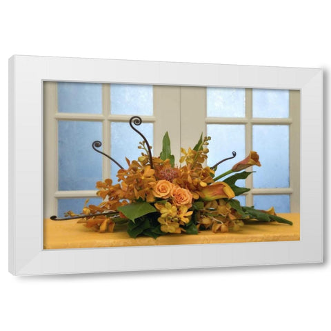 Flower arrangement on table in front of door White Modern Wood Framed Art Print by Paulson, Don