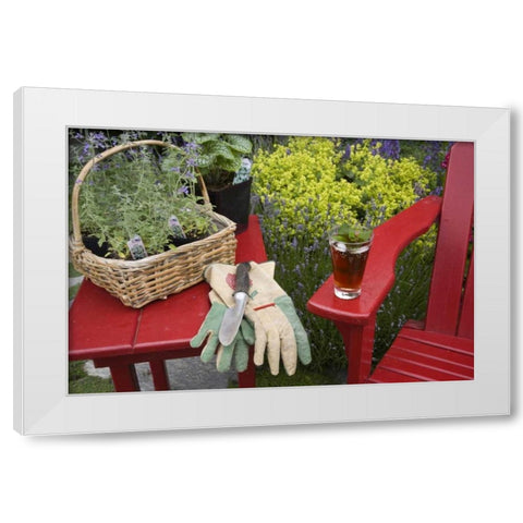 Ice tea rests on red chair while gardening White Modern Wood Framed Art Print by Paulson, Don