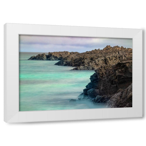 Lava rocks along tranquil shoreline of San Cristobal Island-Galapagos-Ecuador White Modern Wood Framed Art Print by Jones, Adam