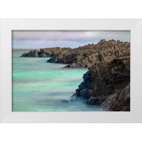 Lava rocks along tranquil shoreline of San Cristobal Island-Galapagos-Ecuador White Modern Wood Framed Art Print by Jones, Adam