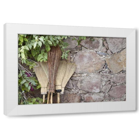 Mexico Brooms leaning against stone wall White Modern Wood Framed Art Print by Paulson, Don