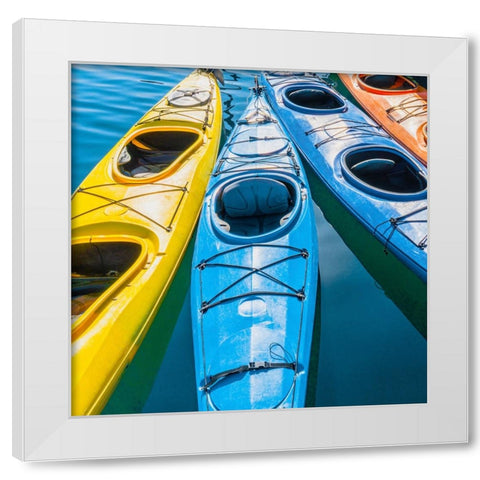Four colorful kayaks positioned in an array. White Modern Wood Framed Art Print by Muir, Janet