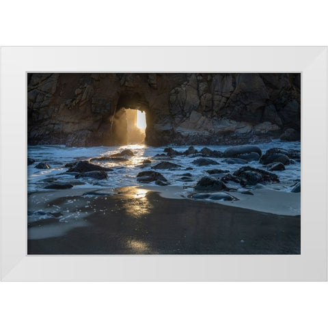 Sun shines through a tunnel in a sea cliff in the Big Sur area. White Modern Wood Framed Art Print by Sederquist, Betty