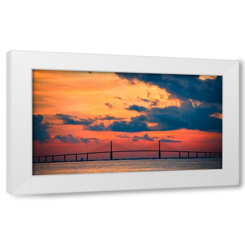 The Skyway Bridge over the Gulf of Mexico with the reds and oranges of the sunrise in the sky White Modern Wood Framed Art Print by Haddad, Sheila