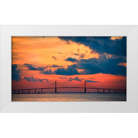 The Skyway Bridge over the Gulf of Mexico with the reds and oranges of the sunrise in the sky White Modern Wood Framed Art Print by Haddad, Sheila