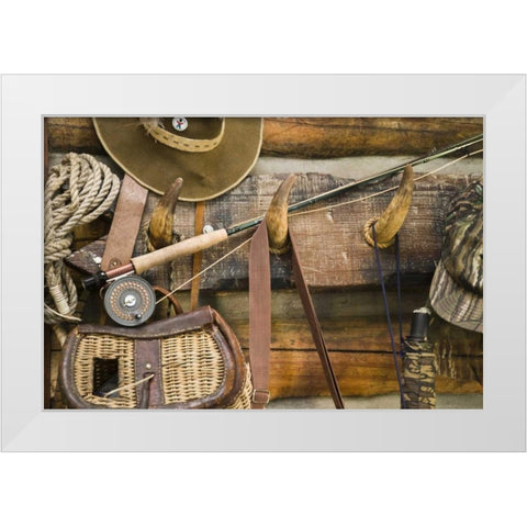 MT, Fishing ger and hat hang on horn pegs White Modern Wood Framed Art Print by Paulson, Don