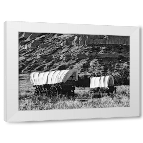 Nebraska, Scotts Bluff Covered wagons in field White Modern Wood Framed Art Print by Flaherty, Dennis
