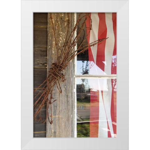 OR, Shaniko Flag in window next to barbed wire White Modern Wood Framed Art Print by Ross, Nancy ,  Steve