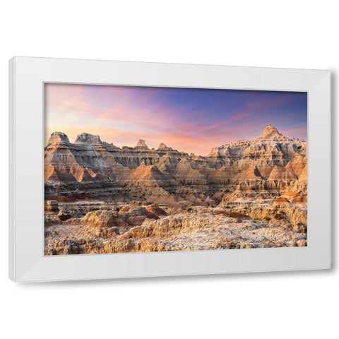 Magnificent set of striated hoodoos set against the backdrop of sunset colors in the sky White Modern Wood Framed Art Print by Haddad, Sheila