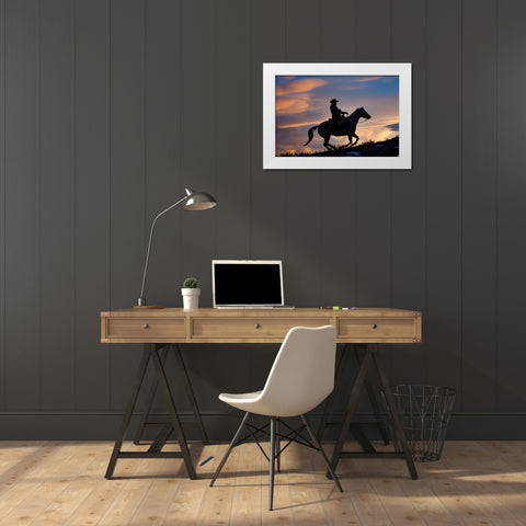 USA- Shell- Wyoming. Hideout Ranch cowboy on horseback silhouetted at sunset.  White Modern Wood Framed Art Print by Gulin, Darrell