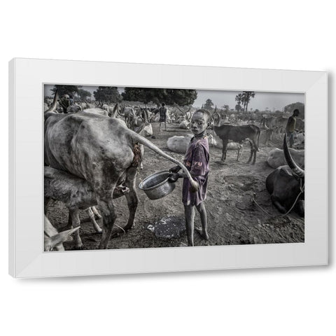 Mundari Child Filling The Container With Cow Urine - South Sudan White Modern Wood Framed Art Print by Inazio Kuesta, Joxe